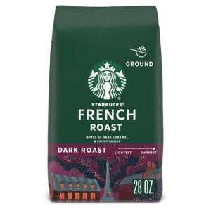Starbucks French Roast Ground Coffee 28-ounce bag displayed next to a ceramic mug of dark brewed coffee.